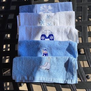 Set of 5 winter themed hand towels.